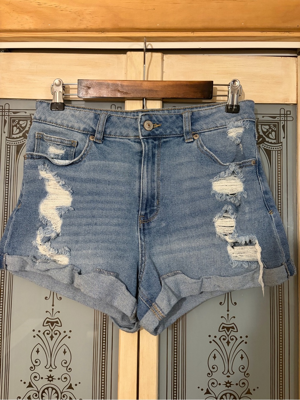 High-Rise Distressed Denim Shorts — Light Blue